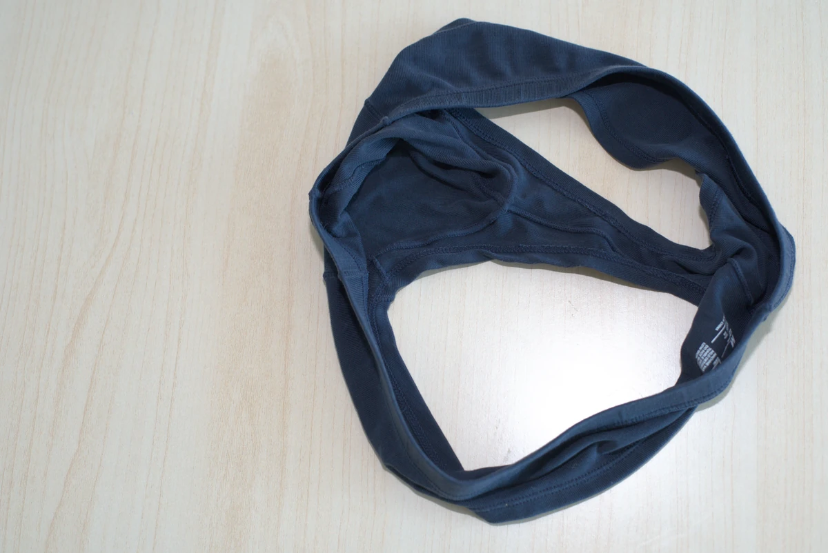 Navy AWRY CHEEKY Thong V2 in Medium: Interior pouch and seam construction.