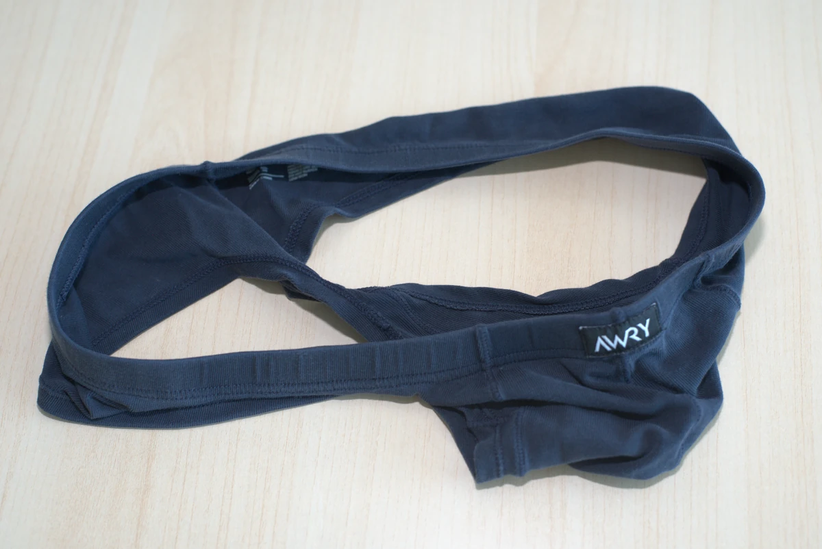 Navy AWRY CHEEKY Thong V2 in Medium: Close view of the fabric-covered waist edge and stitching.