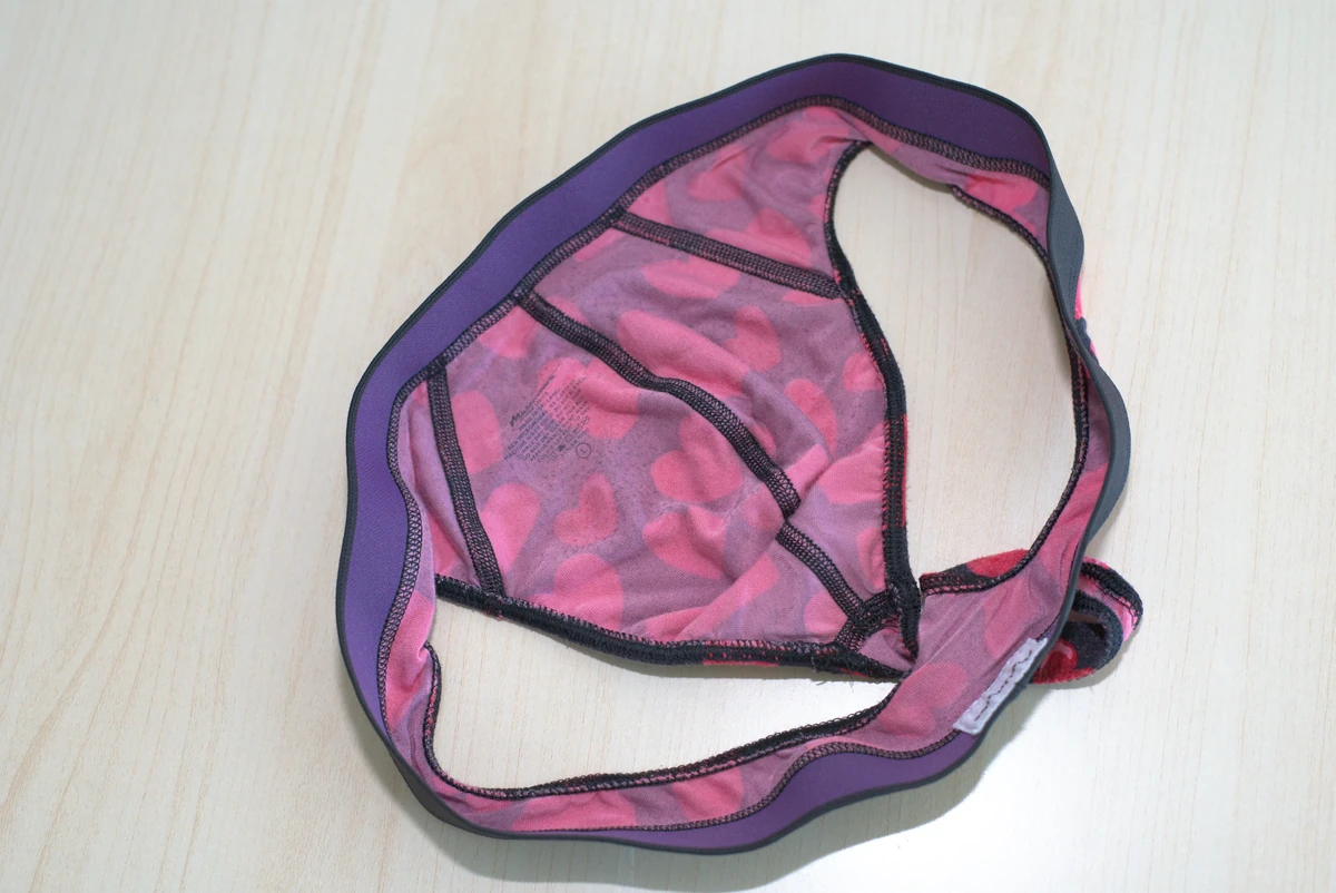 Inside of the MeUndies Pouch Front Thong pouch, showing the center seam, interior fabric and edge binding.