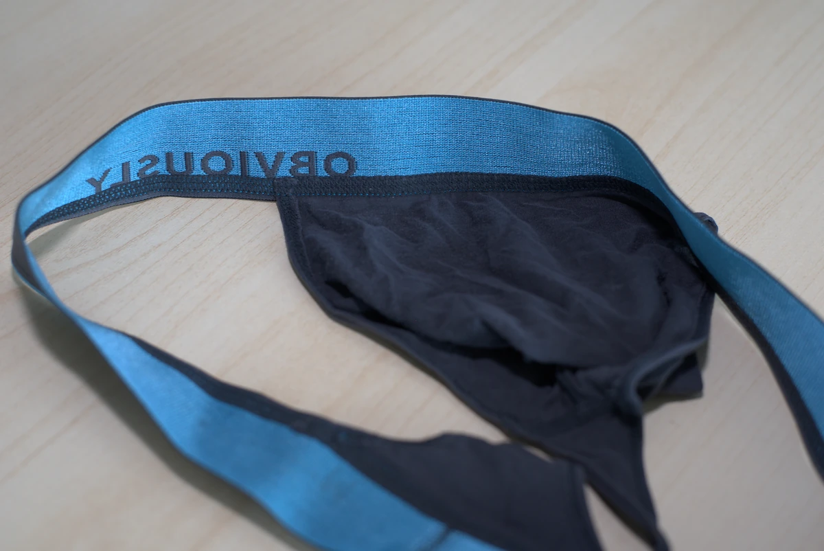 Close-up of the Obviously waistband and lightweight Titanium fabric.