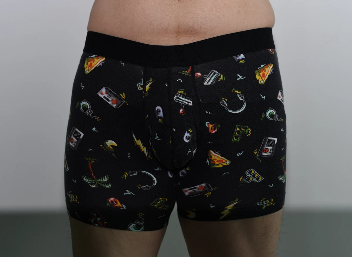 Front view of the black patterned SAXX DropTemp Cooling Cotton Boxer Brief in Medium, showing the full garment.