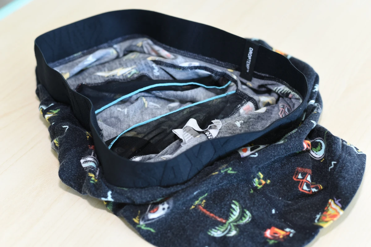 Close view of the SAXX boxer brief interior, showing mesh, panel edging and patterned fabric.